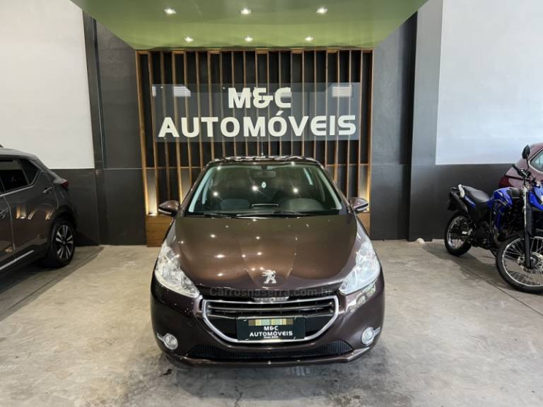 PEUGEOT - 208 - 2013/2014 - Marrom - R$ 38.900,00